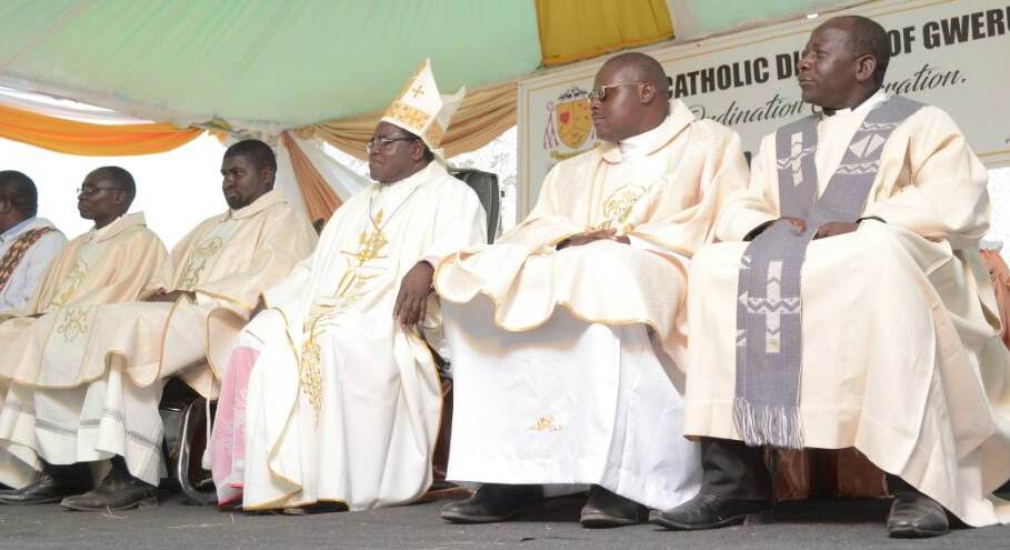 Bishop Michael Bhasera in the middle flanked by Fr. Alex Mapfuti (right), Fr. Thomas Tsikira (second from right), and Fr. Tinashe Wunganai (immediate left) and the Vicar General of Gweru Diocese, Fr. A.jpg